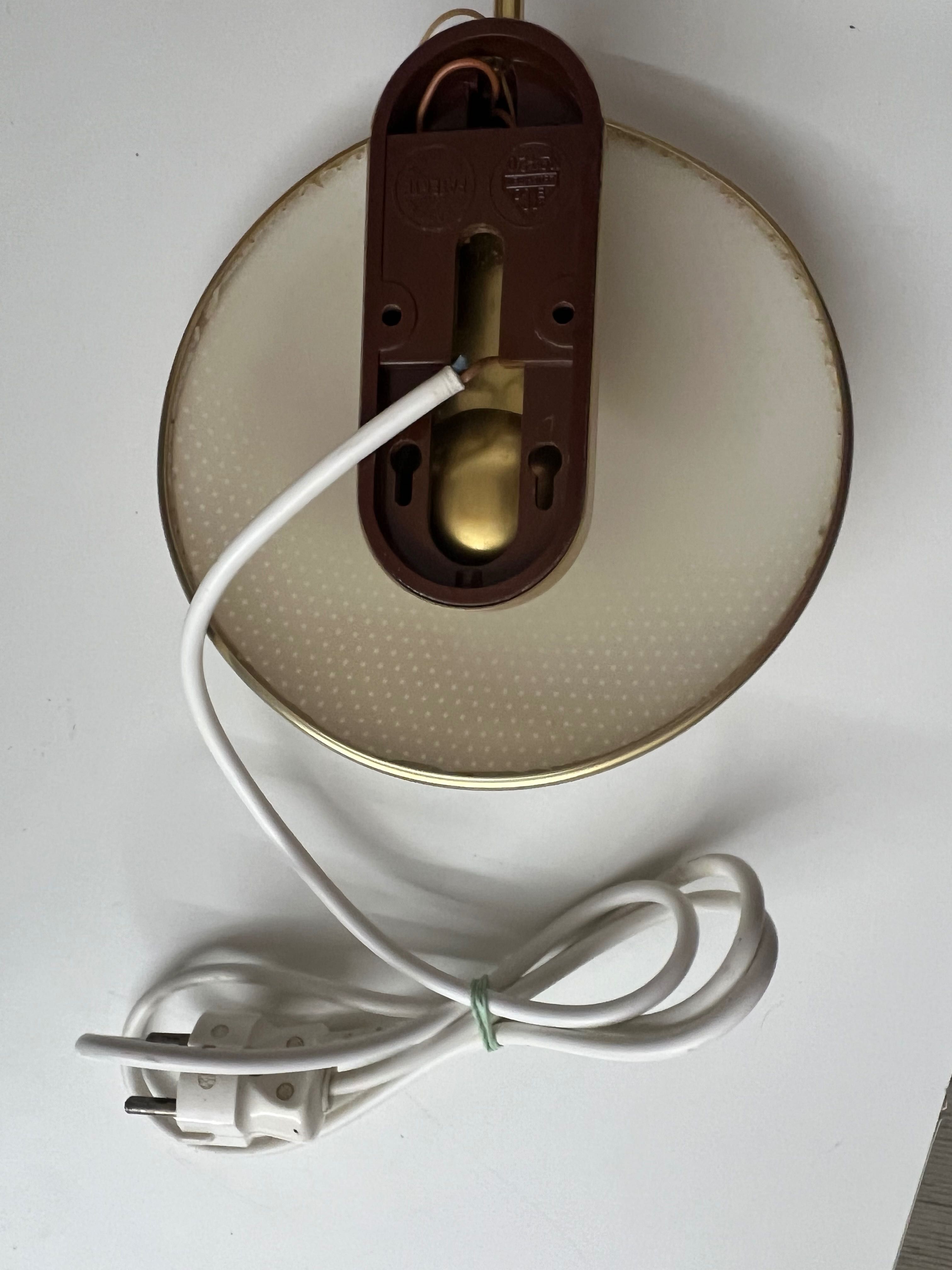 Aplique de parede da Erco com interruptor por corda