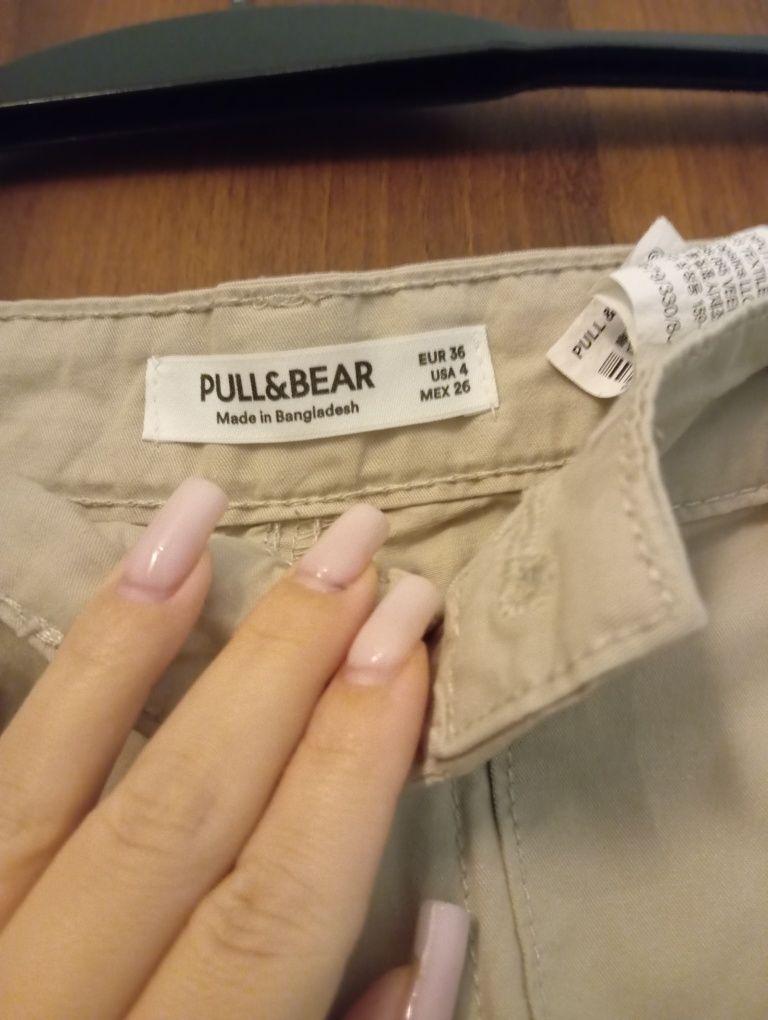 Beżowe spodnie cargo pull and bear tanio cheap woman kobieta