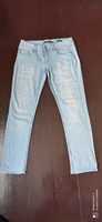 Spodnie jeansy jasnoniebieskie Reserved