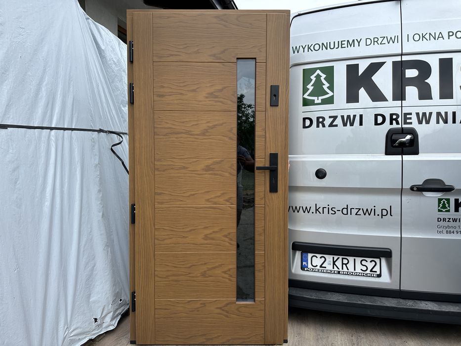 Drzwi zewnetrzne drewniane Montaż Cała Polska dębowe czarna szyba