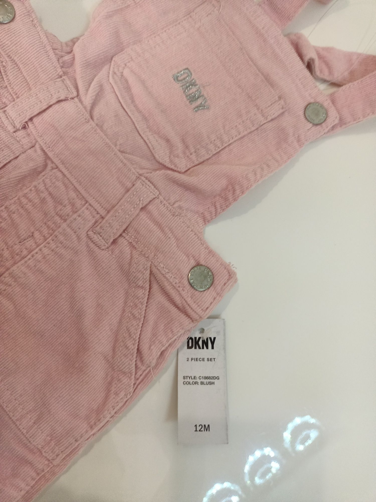 Nowe ogrodniczki DKNY rozm. 9-12m