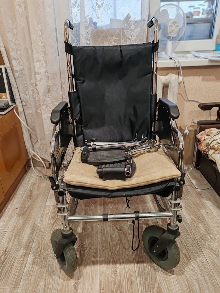 Коляска для інвалідів