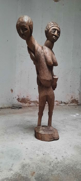 Escultura ° Duas cabeças