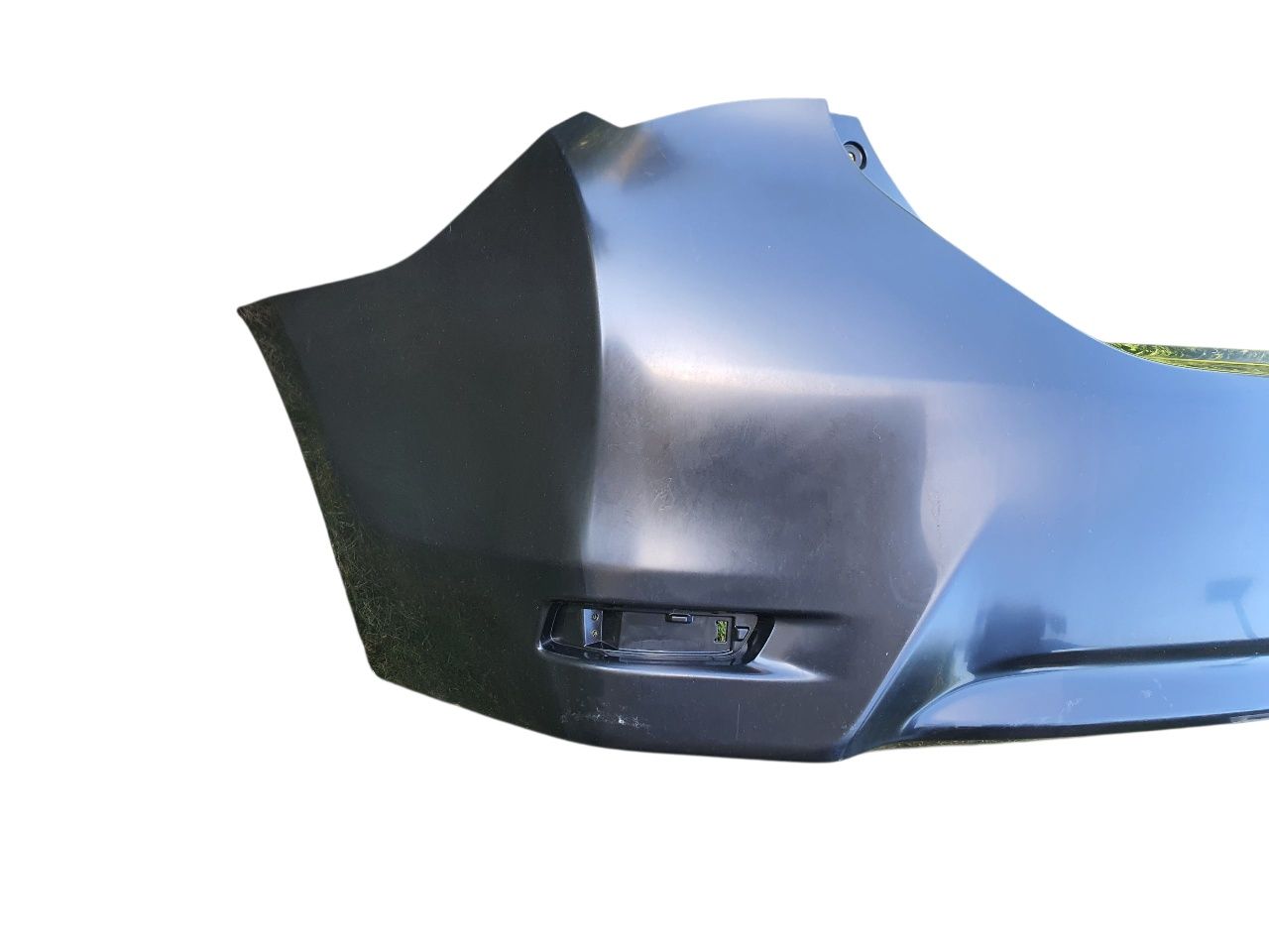 TOYOTA COROLLA E16 zderzak tylny nowy oryginał sedan 13-18