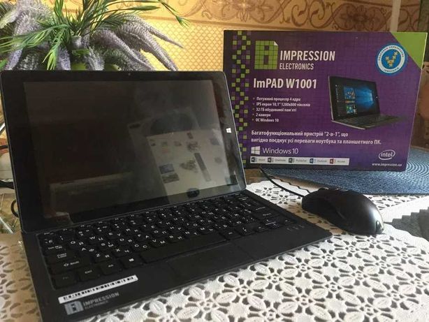 Продам или обменяю ноутбук-планшет на windows 10 ImPAD w1001. Новый