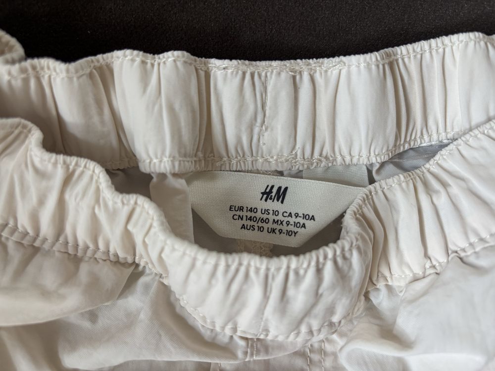 Spodnie kremowe H&M