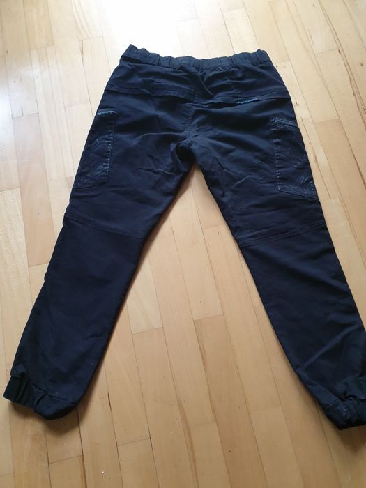 Spodnie czarne młodzieżowe chłopięce Cropp 30 Slim Fit