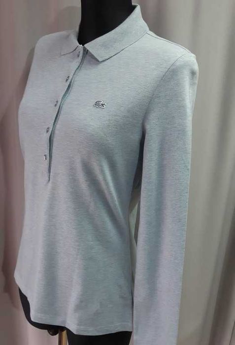 Поло голубое меланж Lacoste