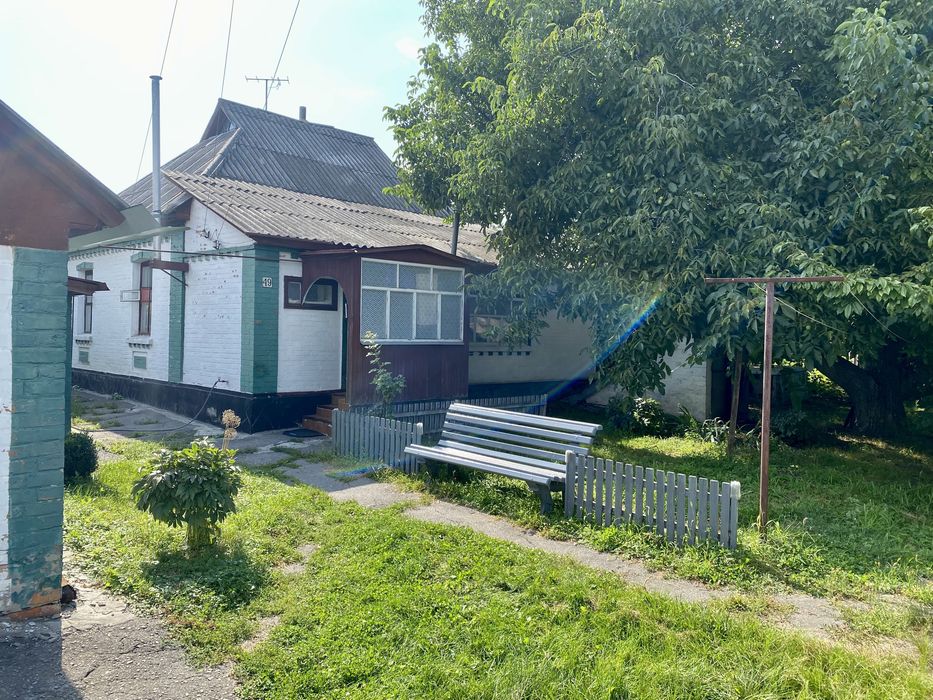 Будинок з усіма зручностями + земля в центрі м. Лубни.