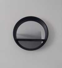 Czarne okrągłe lustro z półką