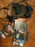 Playstation 2 com 2 comandos e diversos jogos