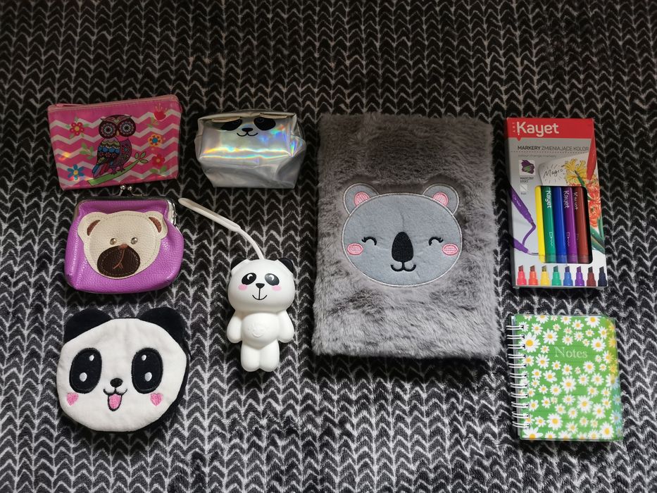 Portfeliki, notesy, etui na klucze, magiczne mazaki.