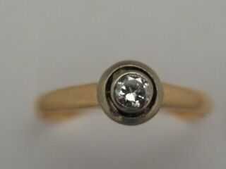 Złoty pierścionek z brylantem ok 0,10 ct r 19