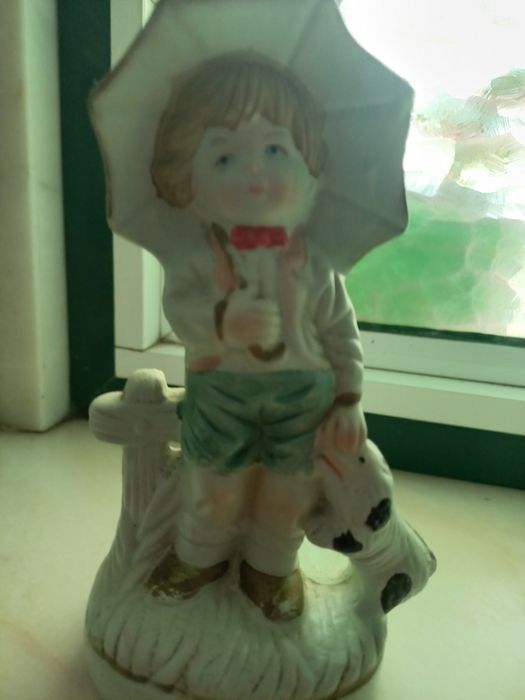 Bonecos em louça pintada