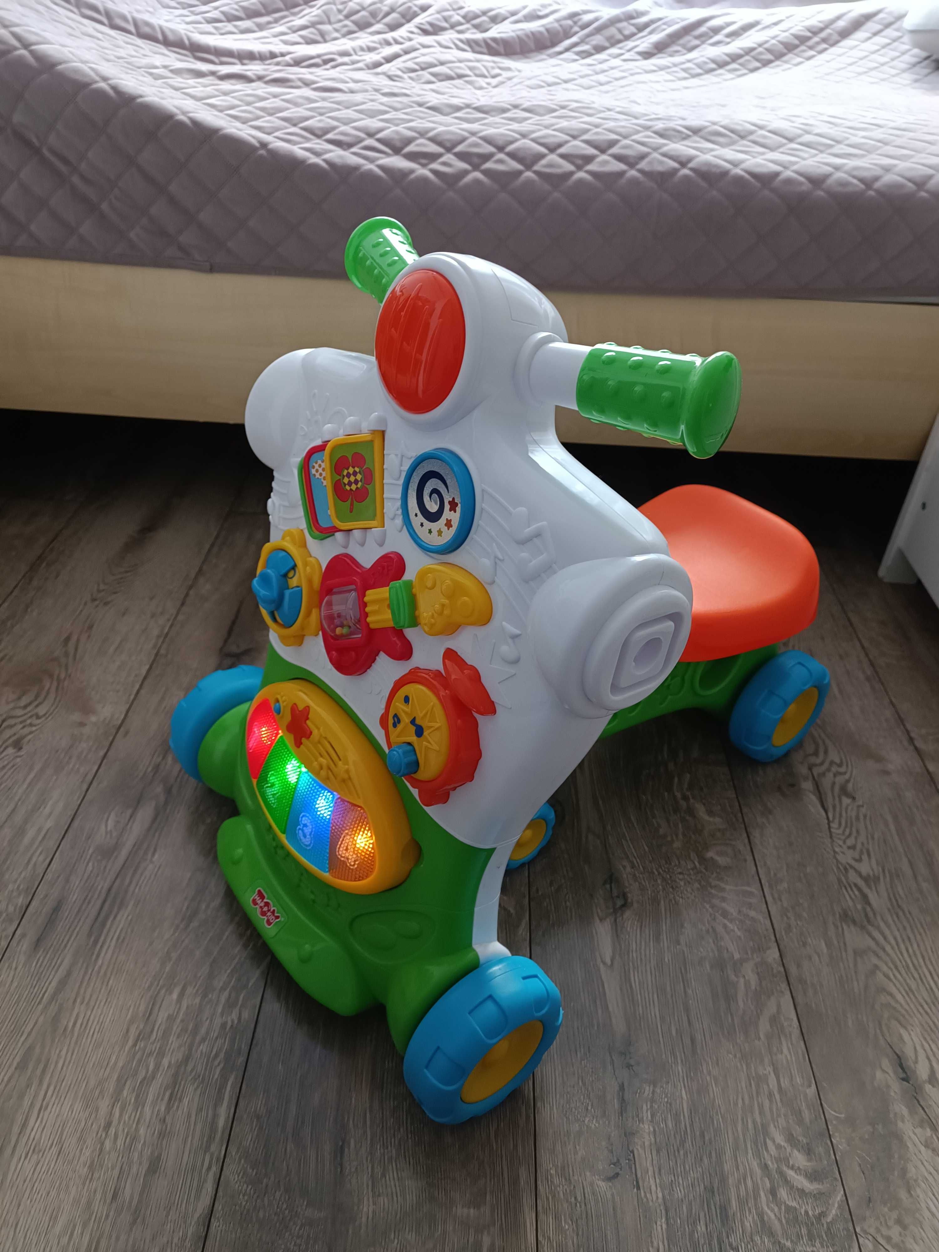 Smiki pchacz/jeździk muzyczny dla dziecka