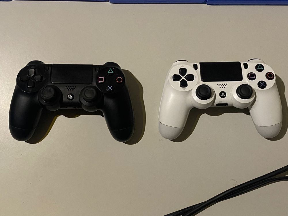 Ps4 branca+2 comandos+6 jogos