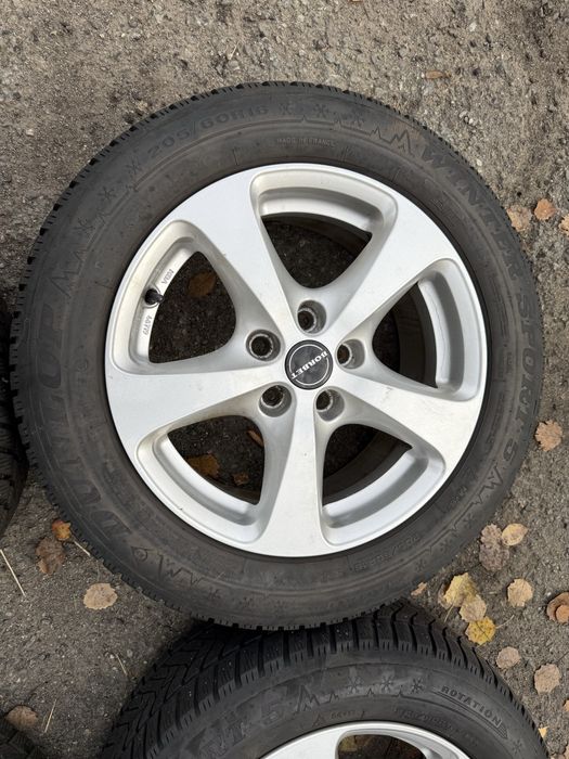 Felgi aluminiowe 5x105 z oponami zimowymi 205/60R16 Opel Astra J ET40