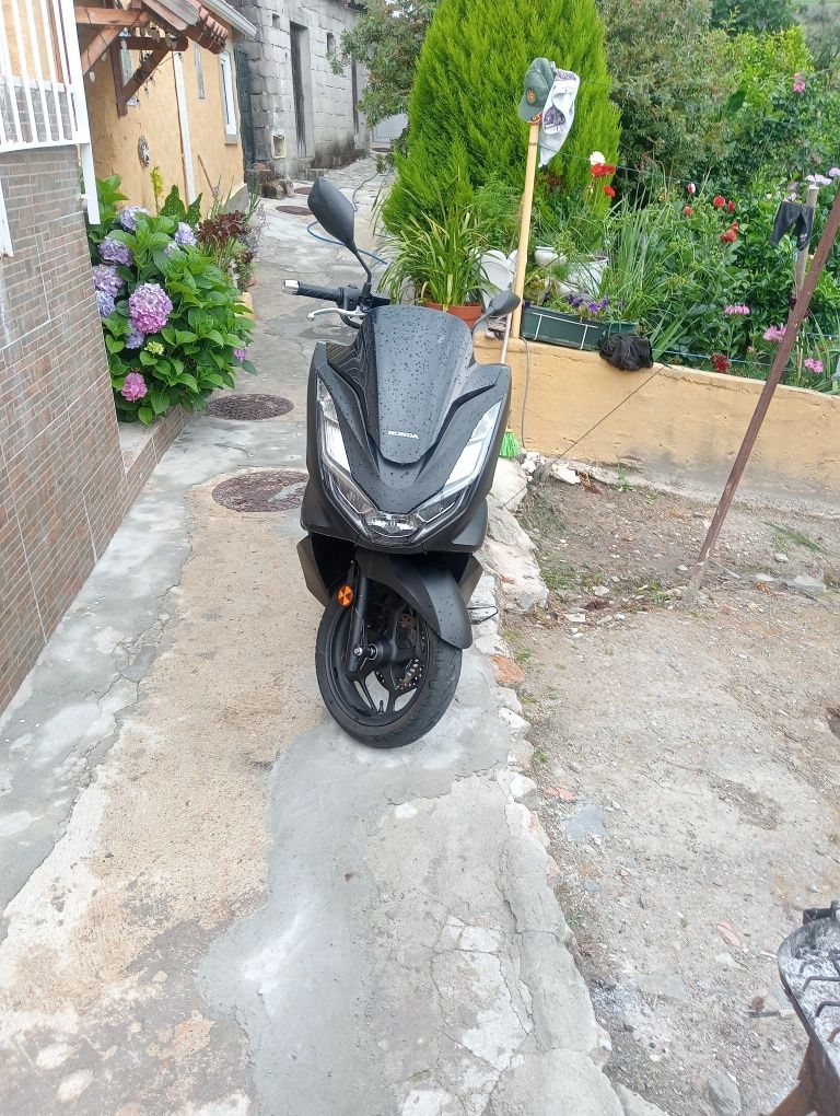 Vendo ou vendo uma  mota Honda 125