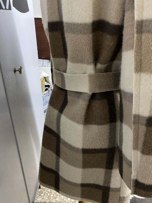 Casaco comprido muito pratico