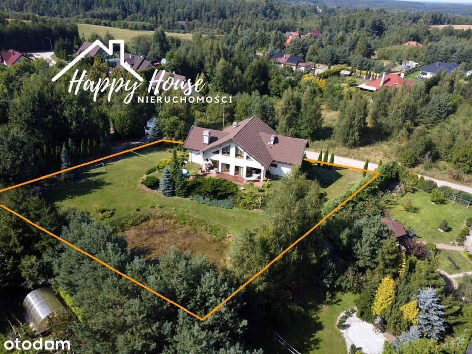 Gotowy dom w otulinie lasu dla lubiących ciszę .