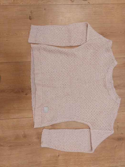 Elegancki różowy sweter