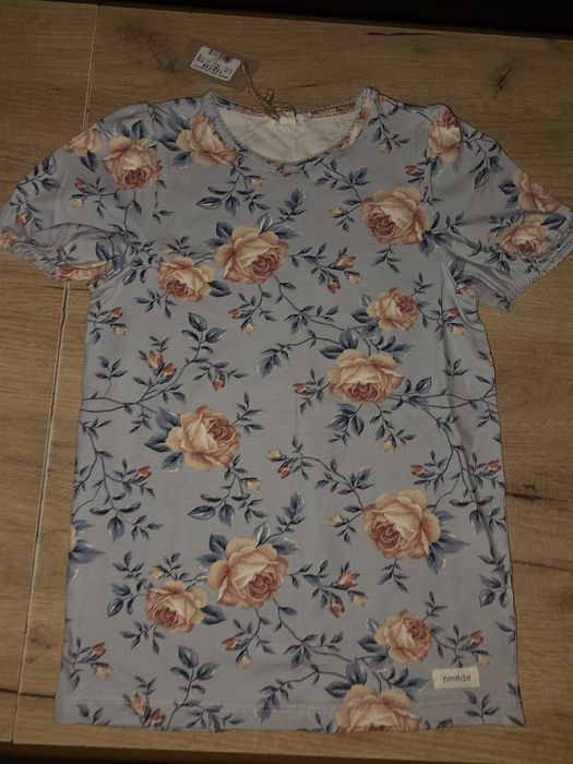 Nowa bluzeczka Newbie piekny wzór 122/128