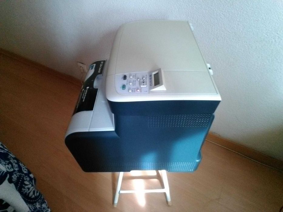 Laser Multifunções a Cores HP CM1312 MFP