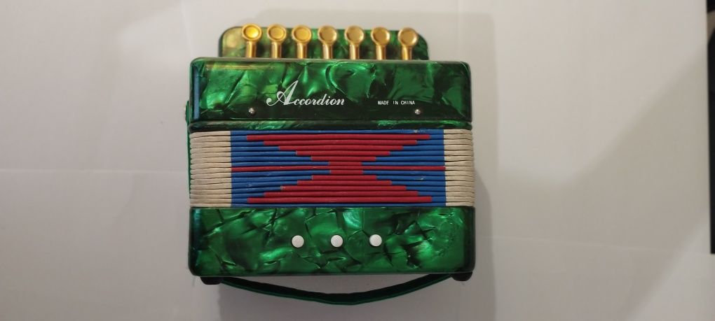 Mini acordion portátil