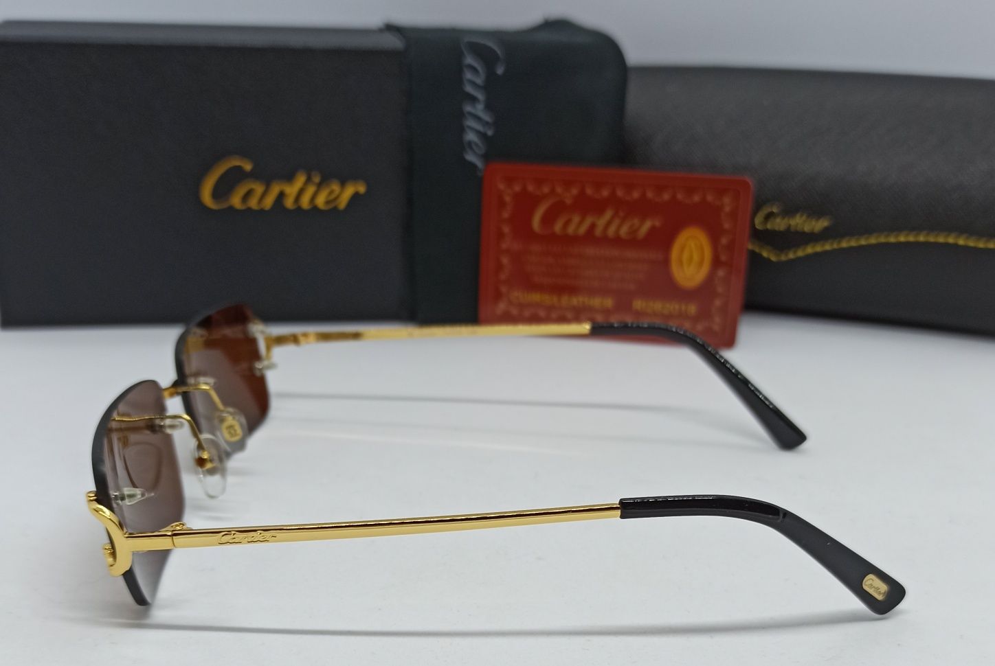 Cartier очки унисекс узкие безоправные коричневые с золотом