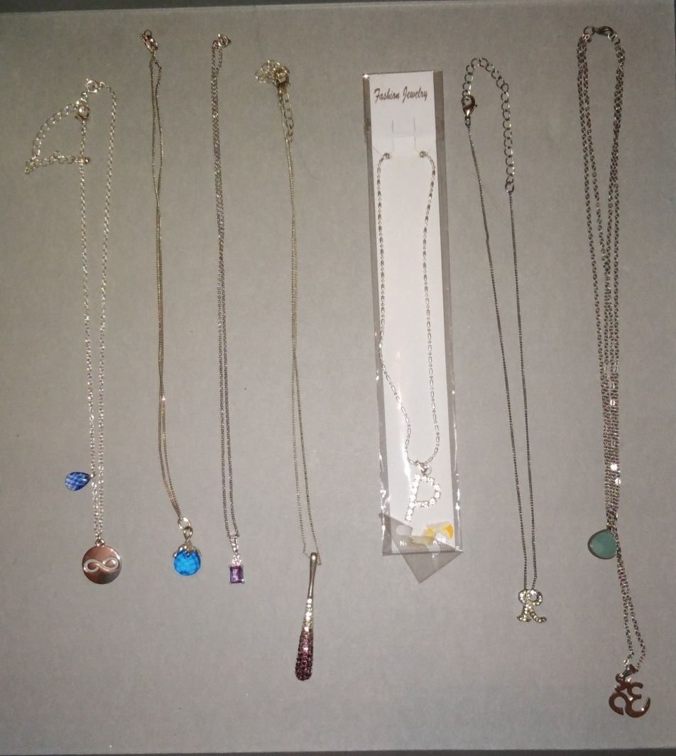 Lote bijuteria (brincos, anéis, pulseiras, fios, colares, pendentes) 2