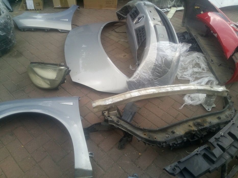 Renault Scenic II dv727 maska błotnik zderzak pas