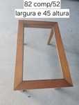 Mesa vintage de centro com tampo de vidro