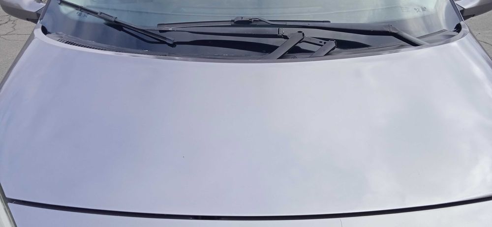 Мінівен Renault Scenic 2005 року. Двигун 1,5 DCI