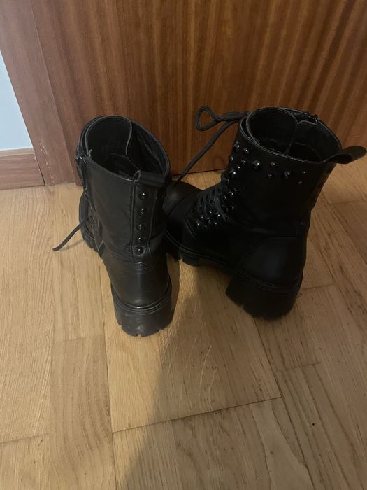 Botas Exê todas em pele