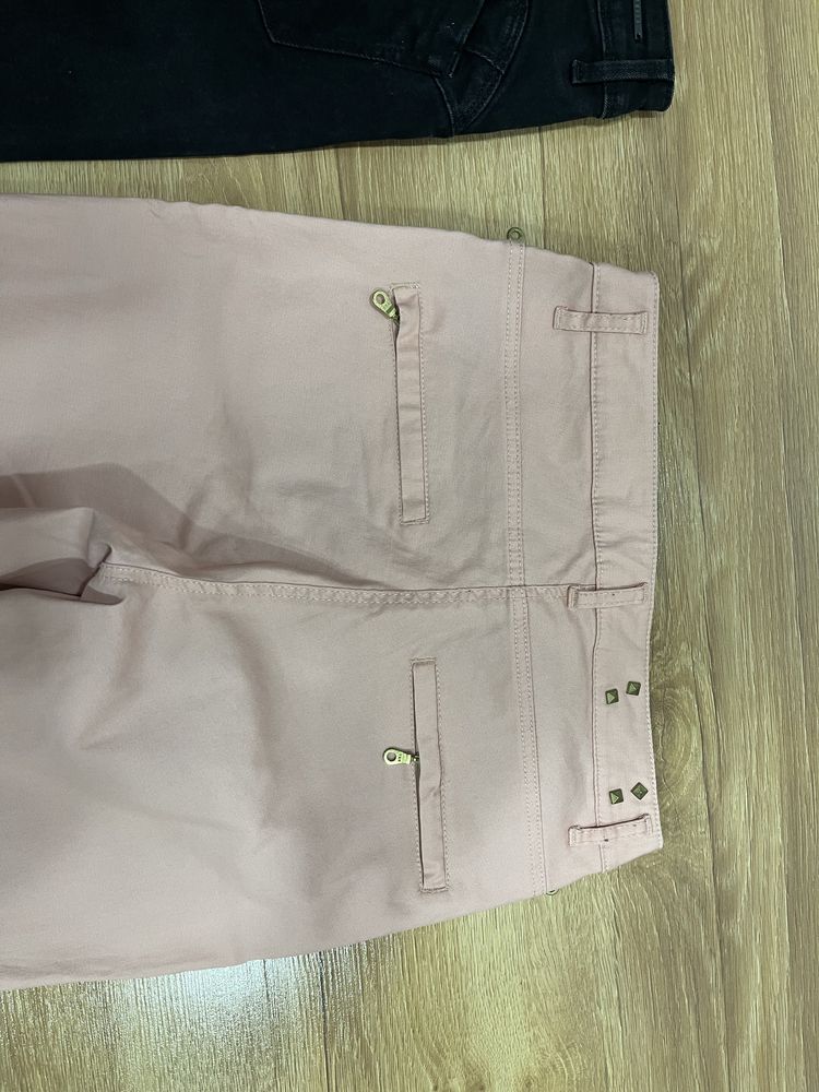 2x spodnie, Mohito pudrowy róż  i H&M czarne. 36