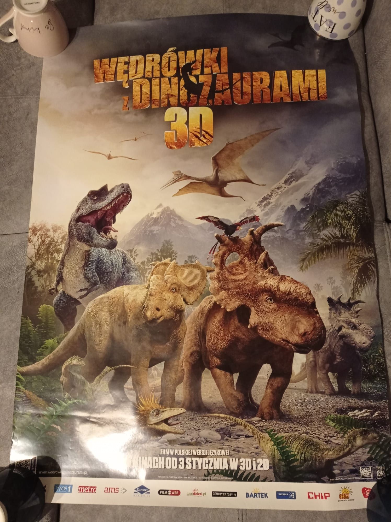 Plakat filmowy "Wędrówki z dinozaurami"