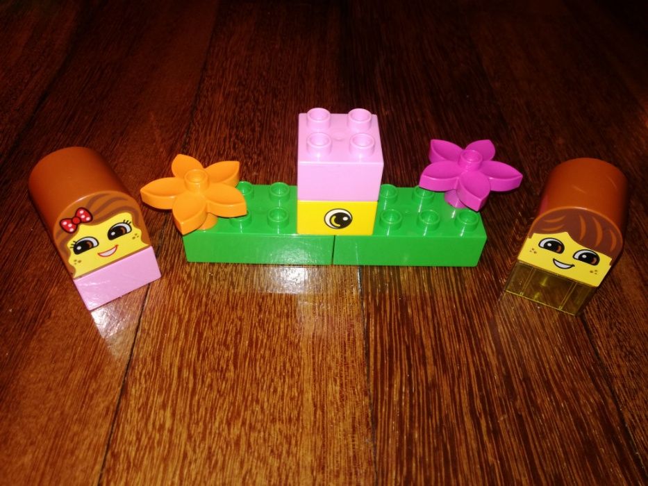 Klocki Lego Duplo mała dziewczynka kwiatki różowe klocki głowy 10 szt.