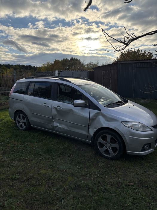 Sprzedam Mazda 5  7-osobowa uszkodzona w gazie