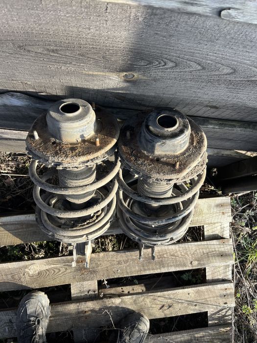 Стойки Крайслер Вояждер 2001-2008 *Оригінал*