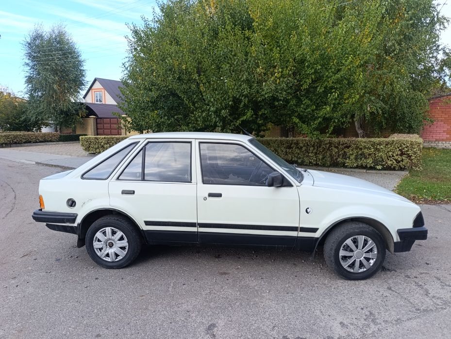 Форд эскорт газ/бензин