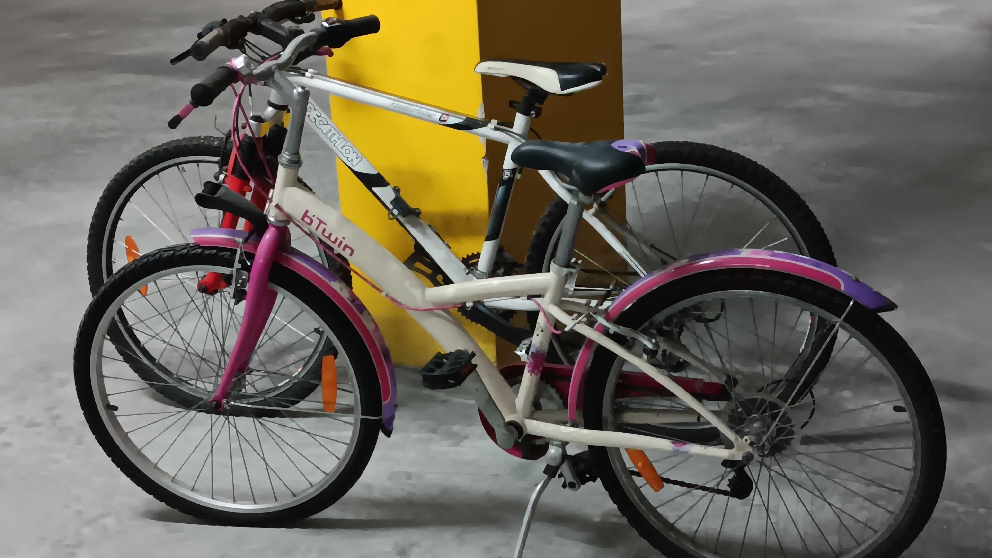 Bicicleta Rochrider adulto de montanha e bicicleta B twin de menina