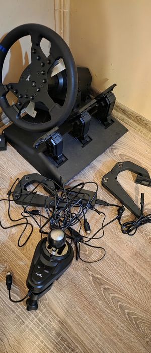 Konsola PS4+VR+stacja ladowania+dysk+kierownica+pistolet+11gier