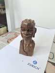 Pequeno busto em madeira