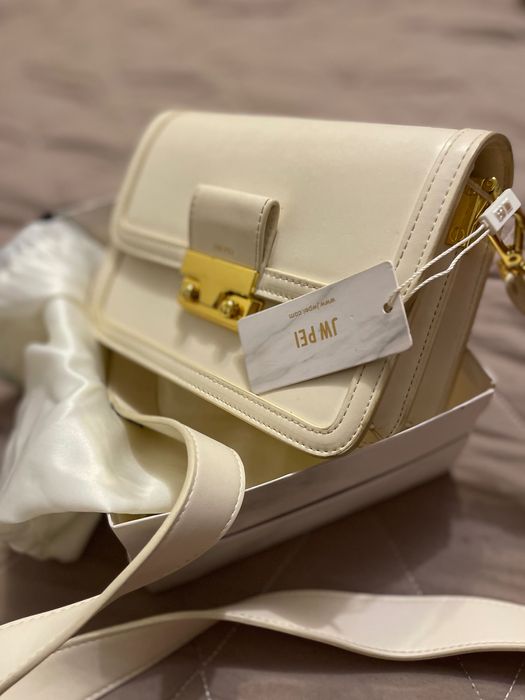 Продам Сумка jw pei молочко кольору