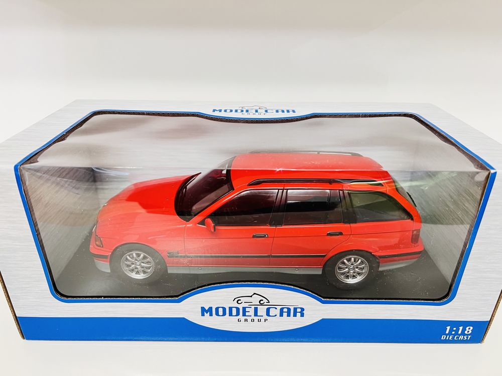 BMW 320i Touring E36 czerwony MCG 1/18