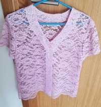 Vendo blusa rendada, tipo casaco,meia manga,de cor rosa.