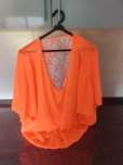 Blusa leve ideal para o verão cor laranja