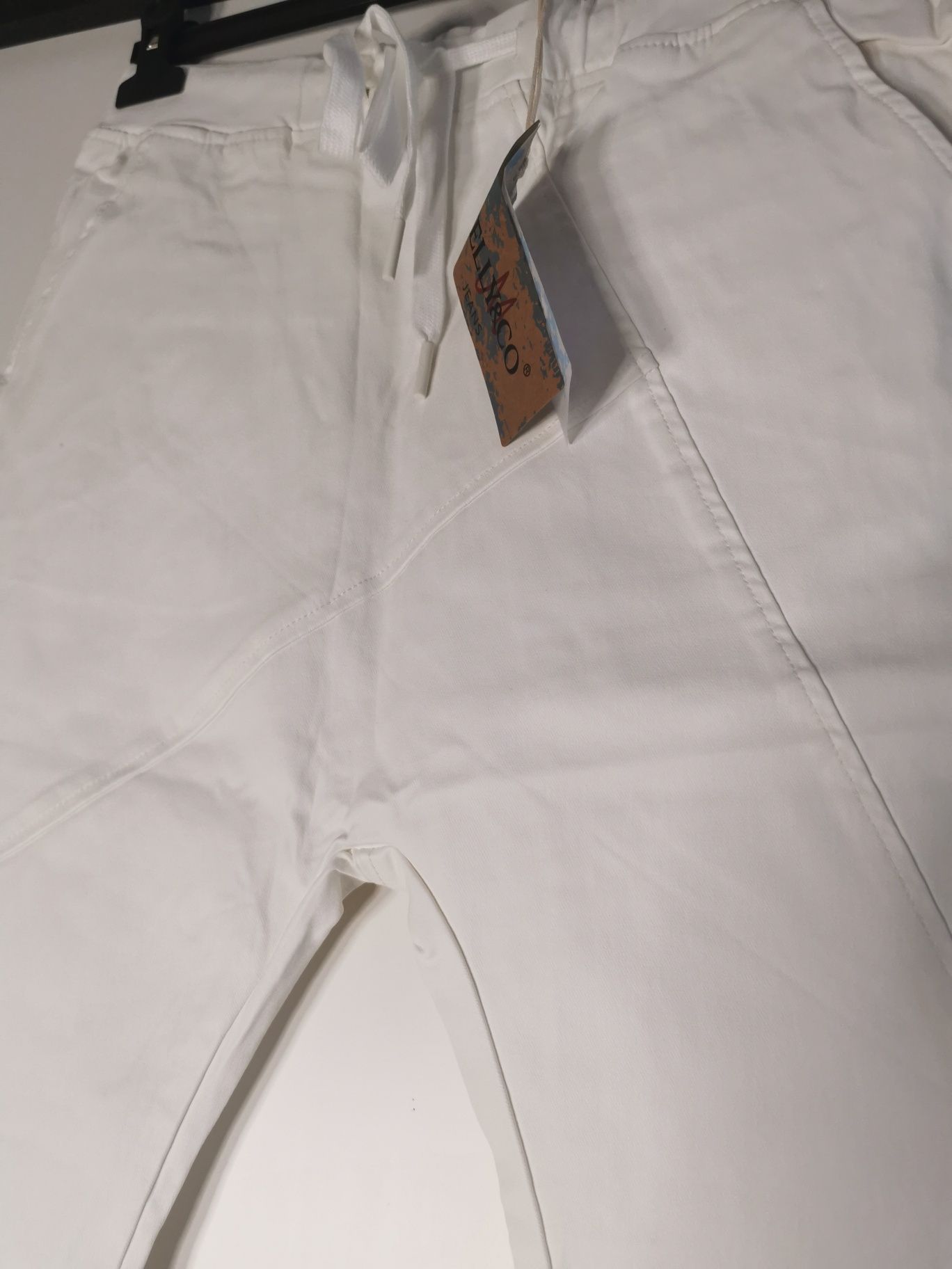 Piękne białe spodnie damskie elastyczne woski woskowane L