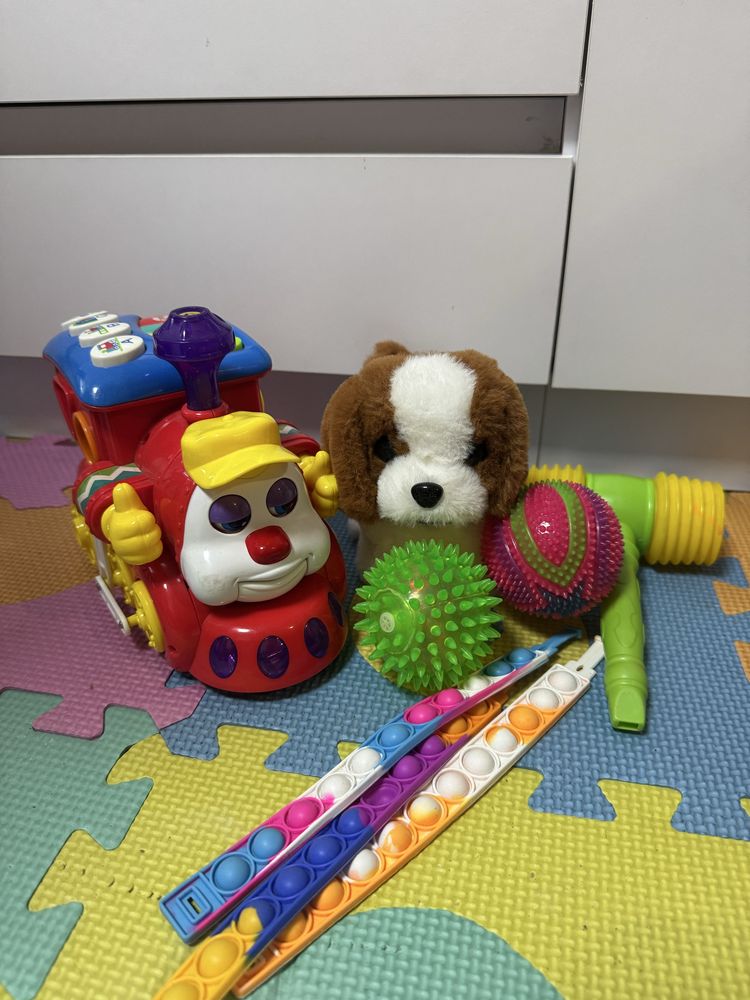 Дитячі іграшки пазли chicco fisher price