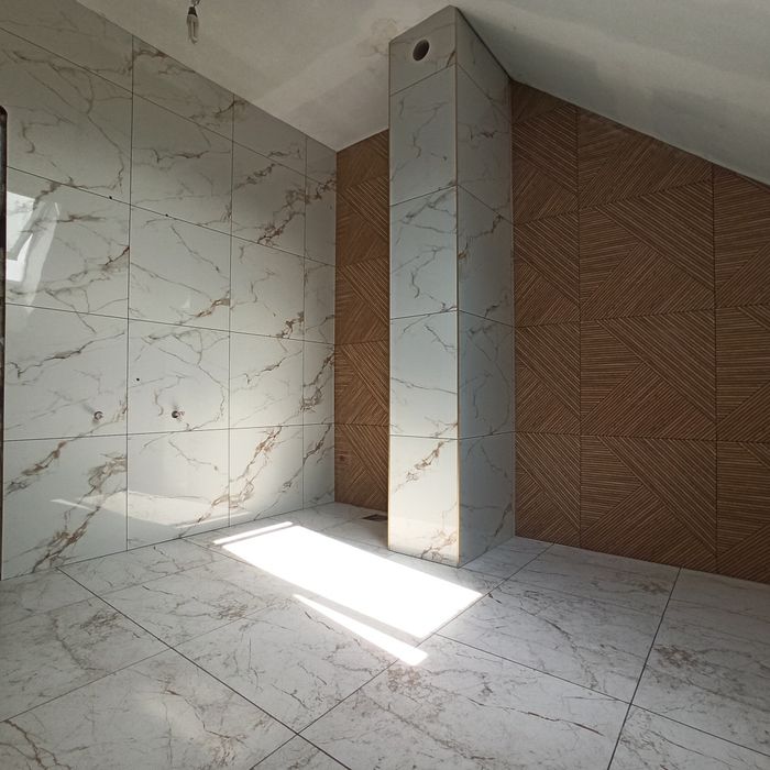 Łazienki Układanie płytek Remonty Wykończenia Gładzie Malowanie